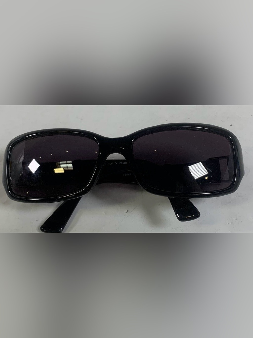 Fendi Black Frame Sunglasses with Dark Lenses